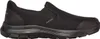 A black Skechers slip-on shoe is shown from the side against a white background. Produktbild-Vorschau