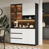 A modern kitchen cabinet with LED lighting, displaying kitchenware and appliances. Podgląd zdjęcia produktu