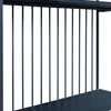 A close-up view of a black metal shelf unit with vertical bars. Náhled obrázku produktu