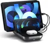 A multi-device charging station with a tablet, two smartphones, and wireless earbuds. Náhled obrázku produktu