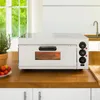 A professional pizza oven is shown on a kitchen countertop, with a window and sink in the background. Produktbild-Vorschau