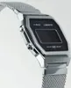 A close-up shot of a silver Casio digital watch with a mesh band. Voir les images du produit