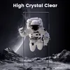 An astronaut floats in space, superimposed over a futuristic landscape, with a clear screen element in the foreground. Produktbild-Vorschau