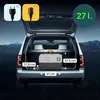 A portable refrigerator is placed in the trunk of a car at night. Náhled obrázku produktu