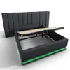 A disassembled bed frame with a headboard and a lifting mattress support mechanism. Produktbild-Vorschau