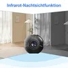 A split image showing a camera's normal view and its night vision view, with the camera in the foreground. Produktbild-Vorschau