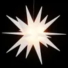 A white, star-shaped LED light against a black background. Produktbild-Vorschau