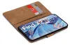 A brown book-style phone case with credit cards inserted, showing a smartphone with a colorful abstract wallpaper. Produktbild-Vorschau