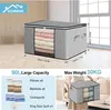 A storage box filled with folded blankets and clothes, with dimensions and capacity information displayed below. Voir les images du produit