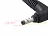 Close-up of a laptop power adapter connector with dimensions indicated. Produktbild-Vorschau