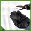 A hand wearing a black glove holds a piece of wire mesh, with metal shears positioned to cut it. Náhled obrázku produktu