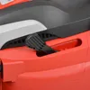 A close-up view of a lever on a red lawnmower. Produktbild-Vorschau