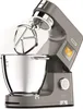 A close-up studio shot of a gray stand mixer with a silver mixing bowl and beater. Produktbild-Vorschau