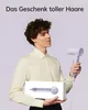 A man holds a hairdryer and its box, with text above. Produktbild-Vorschau