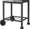 A close-up view of the lower section of a black charcoal grill, showing its frame, wheels, and a lower shelf. Produktbild-Vorschau
