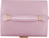 A close-up view of a pink jewelry box with a gold handle. Náhled obrázku produktu
