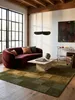Teppich Erdtöne-Grün rechteckig im Wohnzimmer mit Couchtisch und Wohnaccessoires Wohnidee skandinavisch modern_#sku_SAF503119376086-SAF503119376087-SAF503119376088# Produktbild-Vorschau
