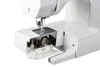 A close-up view of the bobbin area of a white sewing machine. Produktbild-Vorschau