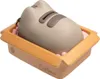 A Pusheen coin bank shaped like a cat in a box. Produktbild-Vorschau
