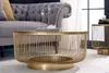 A living room setting with a sofa and coffee table. Produktbild-Vorschau