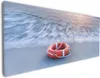 Wallario Premium Leinwandbild Rettungsring am Strand bei Produktbild-Vorschau 1
