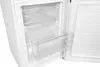 Close-up view of the interior of a white refrigerator or freezer, showing clear plastic drawers and shelves. Produktbild-Vorschau