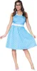 A woman wearing a polka dot dress. Produktbild-Vorschau