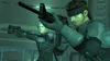 Two characters from the Metal Gear Solid video game series are shown aiming their weapons. Náhled obrázku produktu