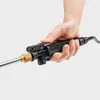 A hand holding a pressure washer spray gun. Produktbild-Vorschau