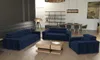 A living room scene with a navy blue sofa set and a coffee table.