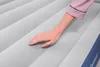 A hand touching an inflatable mattress. Produktbild-Vorschau