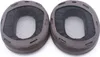 Two brown headphone ear pads are shown side-by-side on a white background. Podgląd zdjęcia produktu