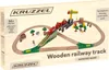The image shows the packaging of a wooden railway track toy for children. The packaging displays an illustration of the assembled toy, including the track, train, crane, and small figures. Podgląd zdjęcia produktu