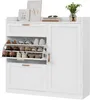 A white shoe cabinet with multiple shelves and drawers, decorated with framed pictures and a plant on top. Produktbild-Vorschau