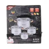 The image shows a box of cookware with a picture of the pots and pans on the front, along with product details and branding. Náhľad obrázku produktu