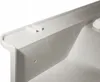 A close-up view of the edge of a white sink basin, showing a textured surface and some embossed markings. Náhled obrázku produktu