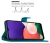 A teal flip case for a smartphone is shown open, displaying the phone's screen with a colorful abstract image. Above the case, there are illustrations and text describing the stand function. Náhled obrázku produktu