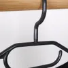 Dix cintres rotatifs en plastique noir - solution pratique Voir les images du produit 4