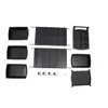 An unassembled salon trolley with multiple drawers and accessories. Voir les images du produit