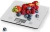 A digital kitchen scale with berries and strawberries on it. Produktbild-Vorschau