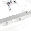 Close-up view of the internal components of a white LED ceiling lamp, showing LED strips and wiring. Podgląd zdjęcia produktu