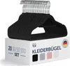 A stack of black velvet hangers on top of a product box. Náhled obrázku produktu