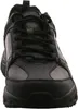 A close-up, front-facing view of a black Skechers shoe. Voir les images du produit