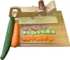 A wooden slicer with a sausage, cucumber, and carrot on a wooden cutting board. Náhled obrázku produktu