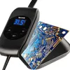 A black electronic device with a digital display and a circuit board. Voir les images du produit