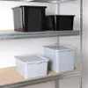 Storage containers on shelves. Voir les images du produit
