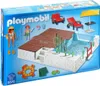 A Playmobil swimming pool playset is shown on its packaging. Voir les images du produit