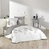 A bedroom setting with a neatly made bed. Produktbild-Vorschau