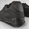 Close-up of the heel and side of a black sneaker. Produktbild-Vorschau