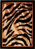 A close-up view of a rug with a tiger stripe pattern. Produktbild-Vorschau